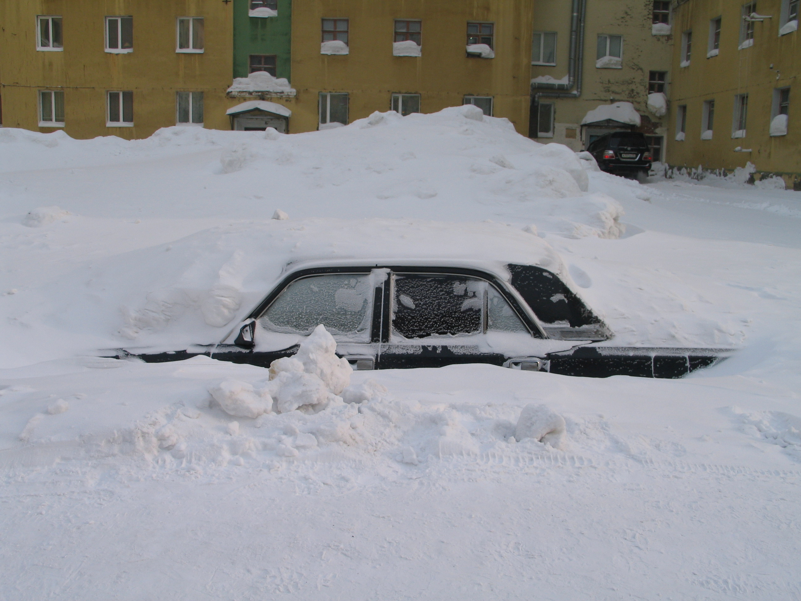 car buried in snow | arizona used car dealers